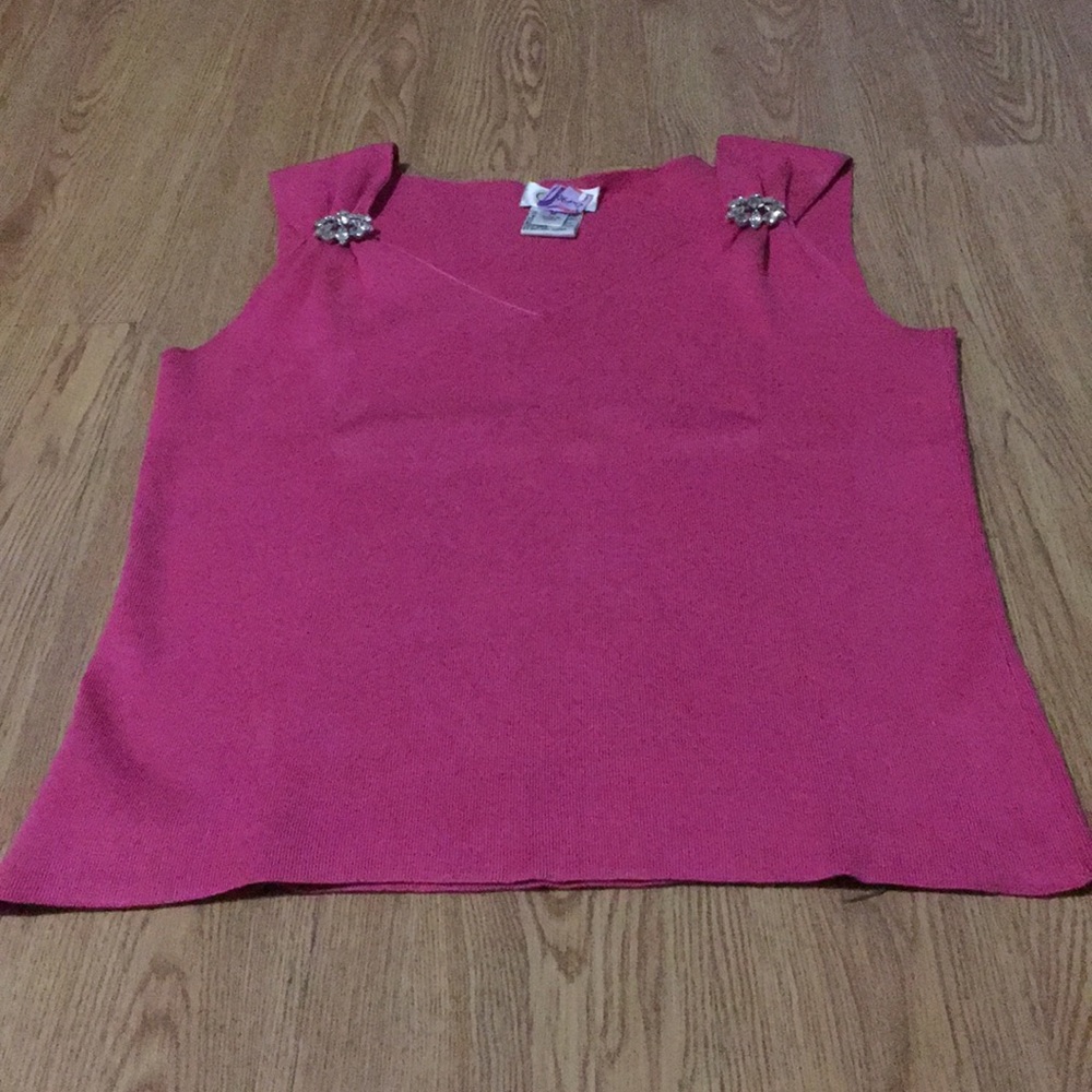 Fuchsia sweater with two rhinestone accents